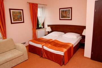 Фото номера Трехместный номер Апарт-отели Aparthotel Ekspresja г. Накло-над-Нотецён 5